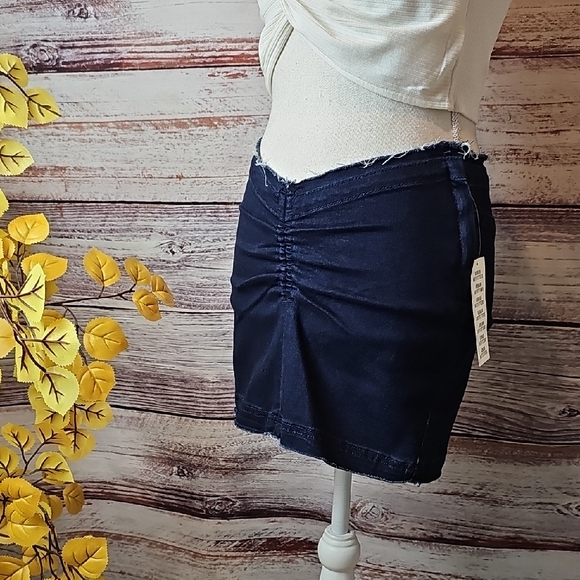 Urban Outfitters Dresses & Skirts - NWT URBAN OUTFITTERS LOW-RISE RUCHED FRONT RAW HEM DENIM STRETCH MINI SKIRT